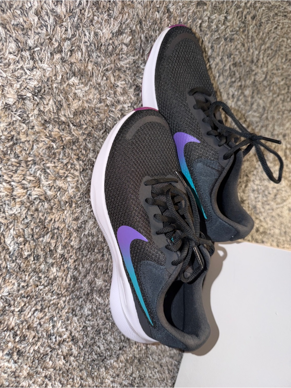 Nike Women’s Black Sneakers with Purple and Teal Swoosh